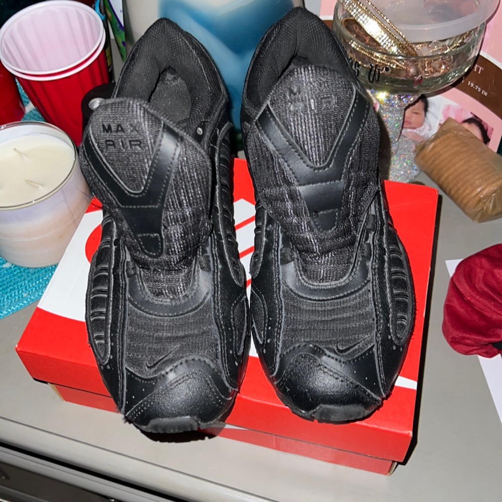 Men Nike all black shoe